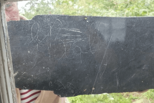 George Bealby was 13 years old when he etched this in the window of the wash house. This is the signature that he retained all his life! "Geo Bealby".